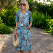 Robe d’été midi femme – Coupe fluide avec manches courtes et poches