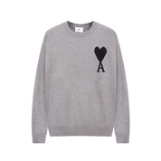 Pull femme Heidi – pull doux à imprimé cœurs & coupe confortable pour l’hiver