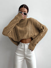 Pull femme Nima – col roulé oversize en maille douce & design intemporel