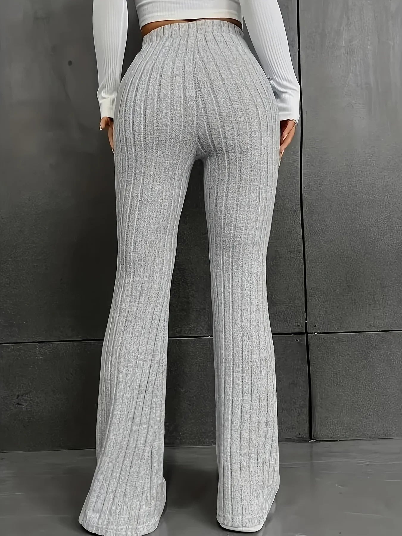 Pantalon femme taille haute slim fit flair en tissu côtelé stretch