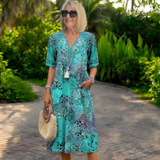 Robe d’été midi femme – Coupe fluide avec manches courtes et poches